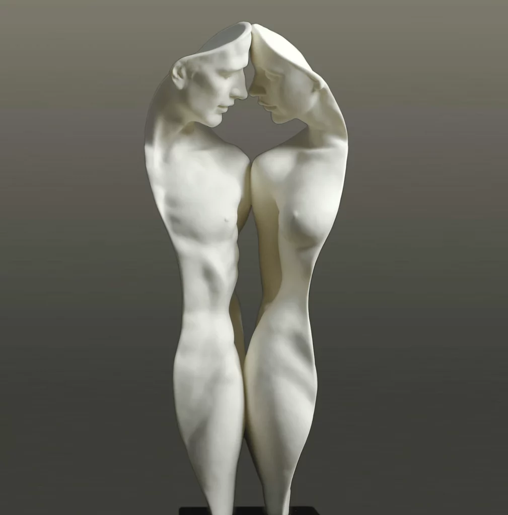 Une sculpture moderne de deux figures humaines allongées et abstraites se faisant face incarne l'essence d'une relation saine. Leurs formes blanches et lisses s'entrelacent gracieusement, transmettant unité et émotion sur un fond neutre, une représentation parfaite de connexion et de compréhension.